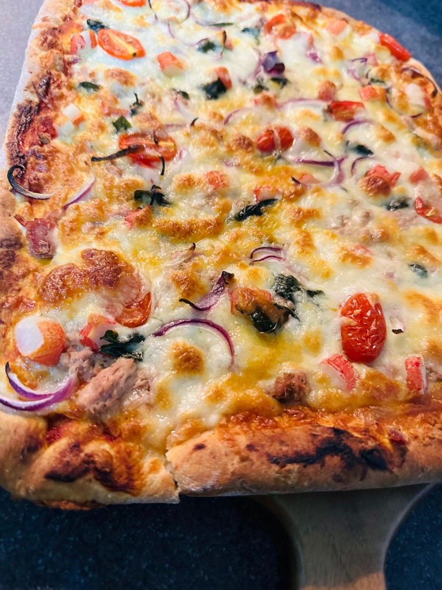 Seafood Pizza with Fresh Basil Leaves