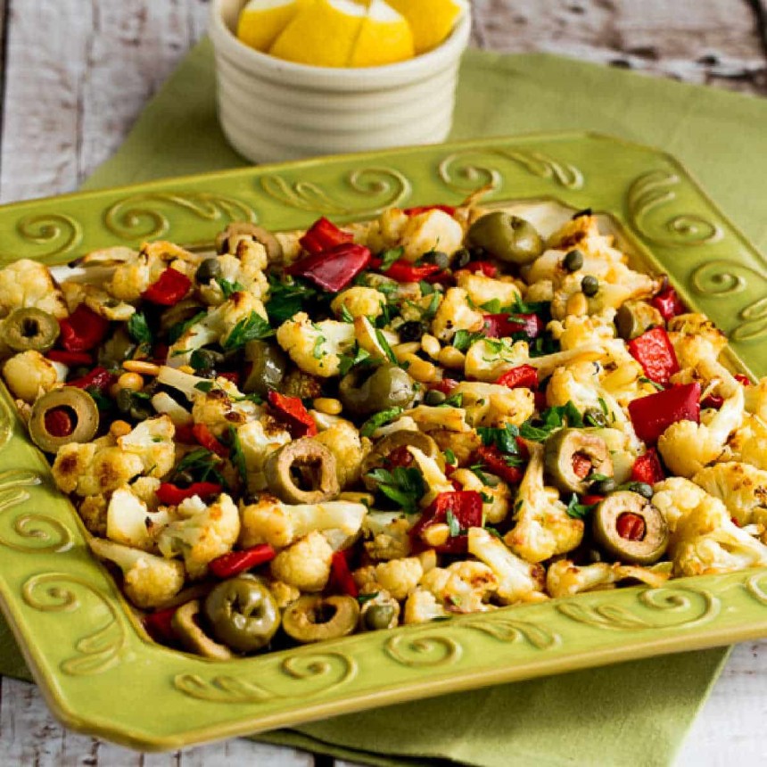 Roasted Cauliflower with Red Peppers, Green Olives, and Pine Nuts